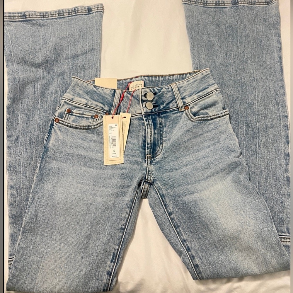 Alice and Olivia low rise bell jeans size 24 all final sale